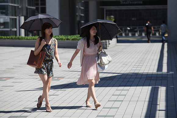 Women in Tokyo with Umbrella